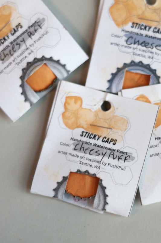 Watercolor Sticky Cap - Cheesy Puff