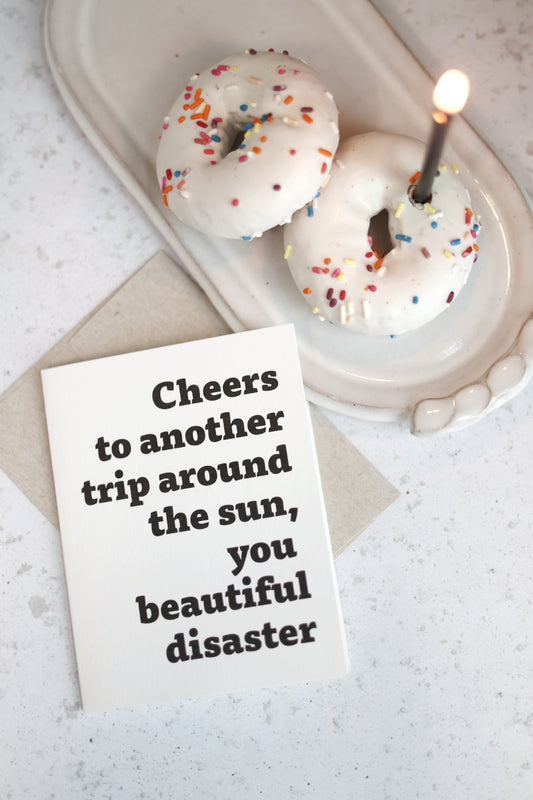 Cheers to another trip around the sun | Greeting card by Gravesco