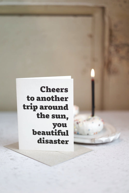 Cheers to another trip around the sun | Greeting card by Gravesco