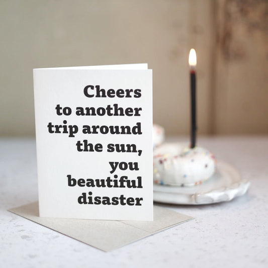 Cheers to another trip around the sun | Greeting card by Gravesco