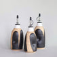 Transformation Olive Oil Cruet in Black and White