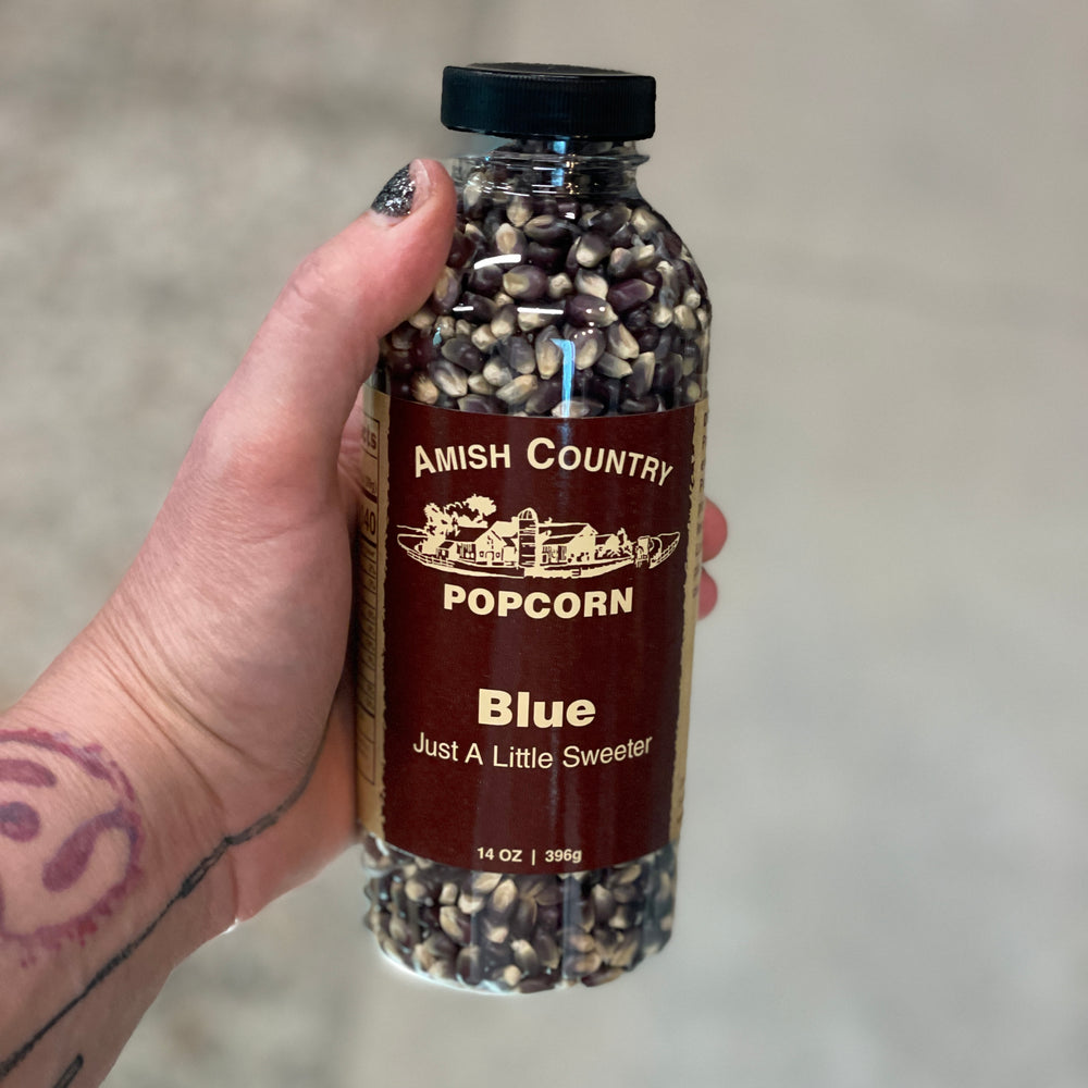 14 oz bottle of Blue popcorn