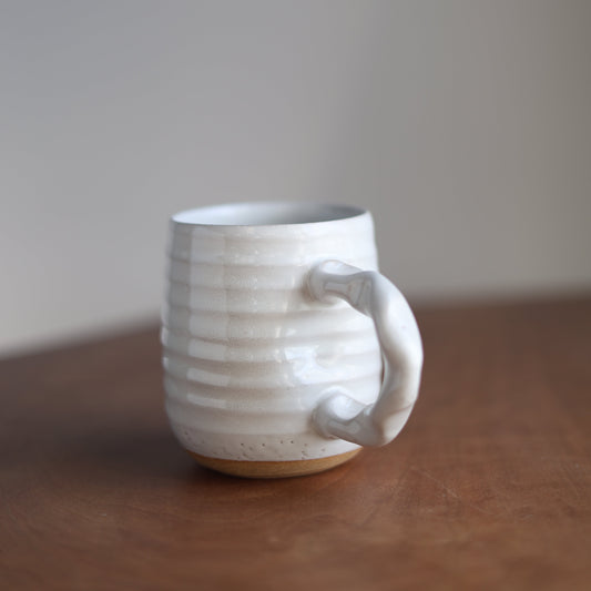 White ceramic mug  on a plain background